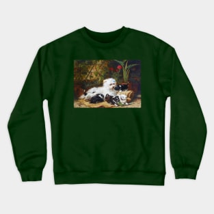 A cairn terrier and her puppies in a conservatory Crewneck Sweatshirt